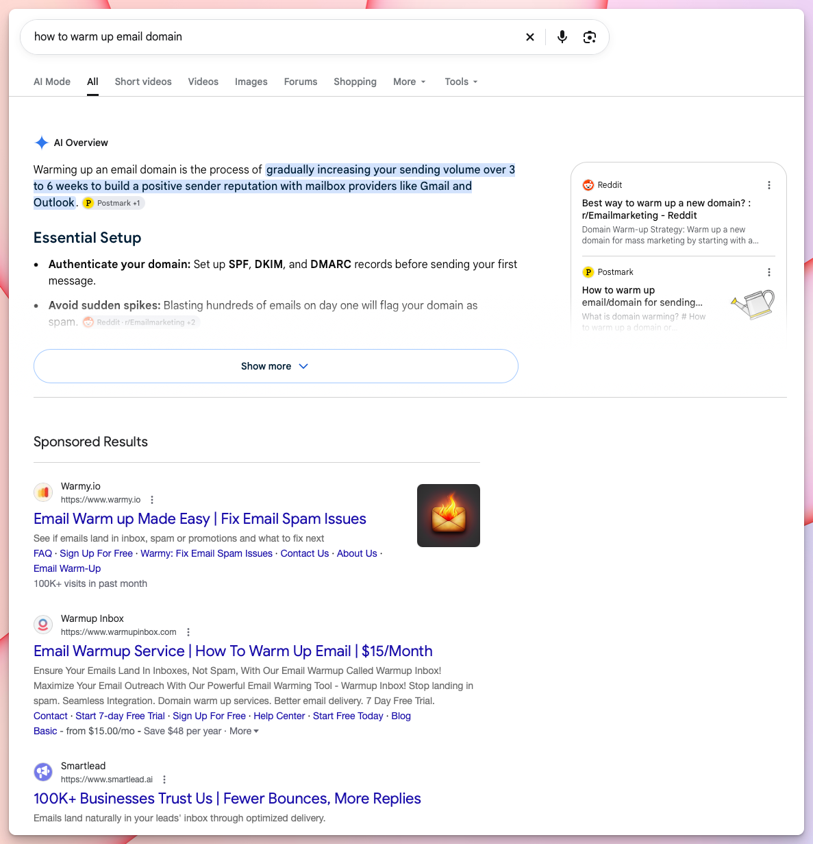 Google search results for "how to warm up email domain" with an AI overview explaining the process based on articles from Postmark and Microsoft, followed by a sponsored result